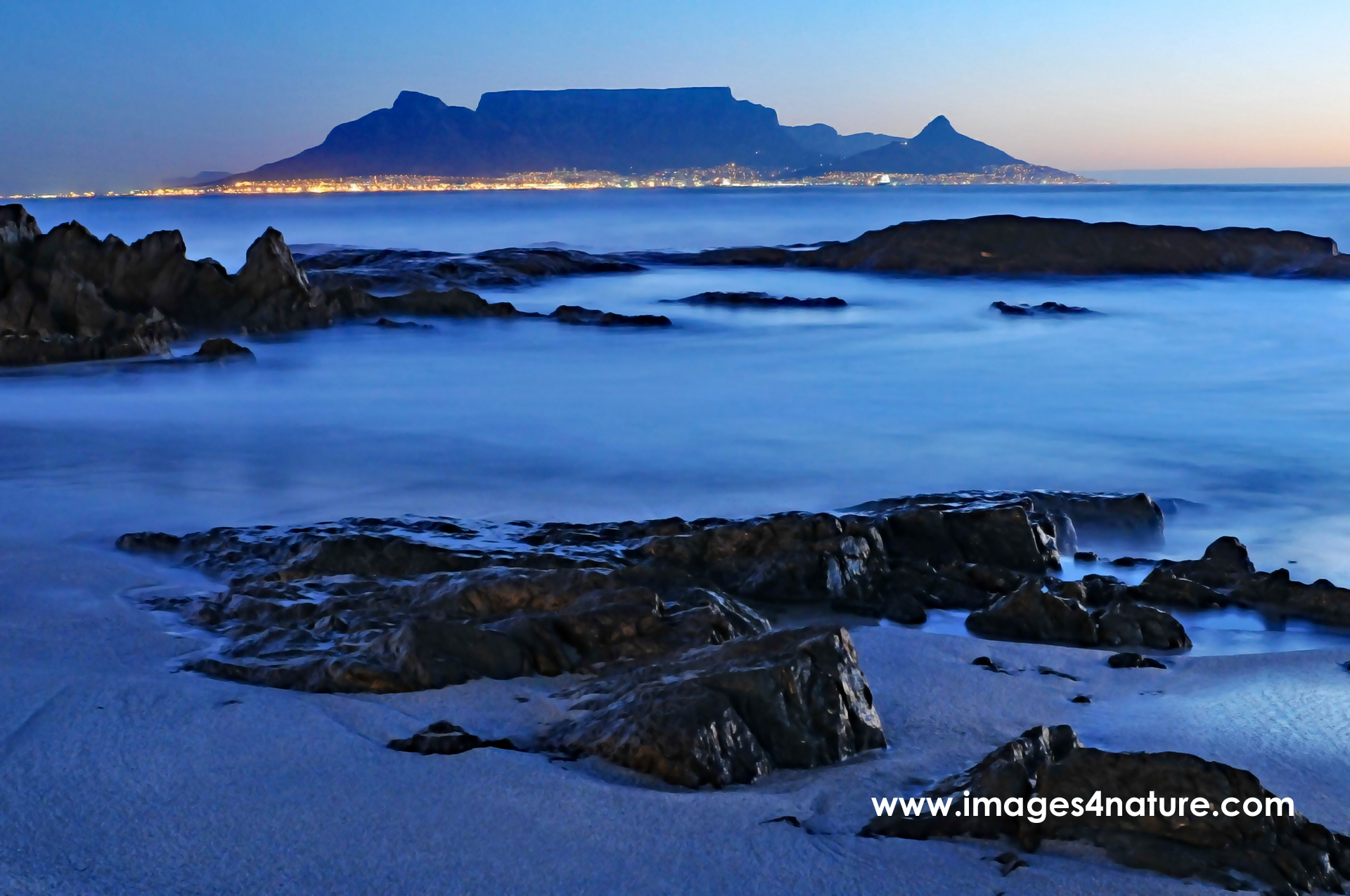 Coastal blue hour against Cape Town and Table Mountain