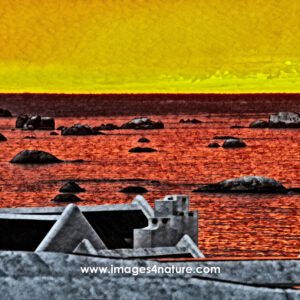 Scenic view of Atlantic ocean at sunset over Cape-Dutch rooftops