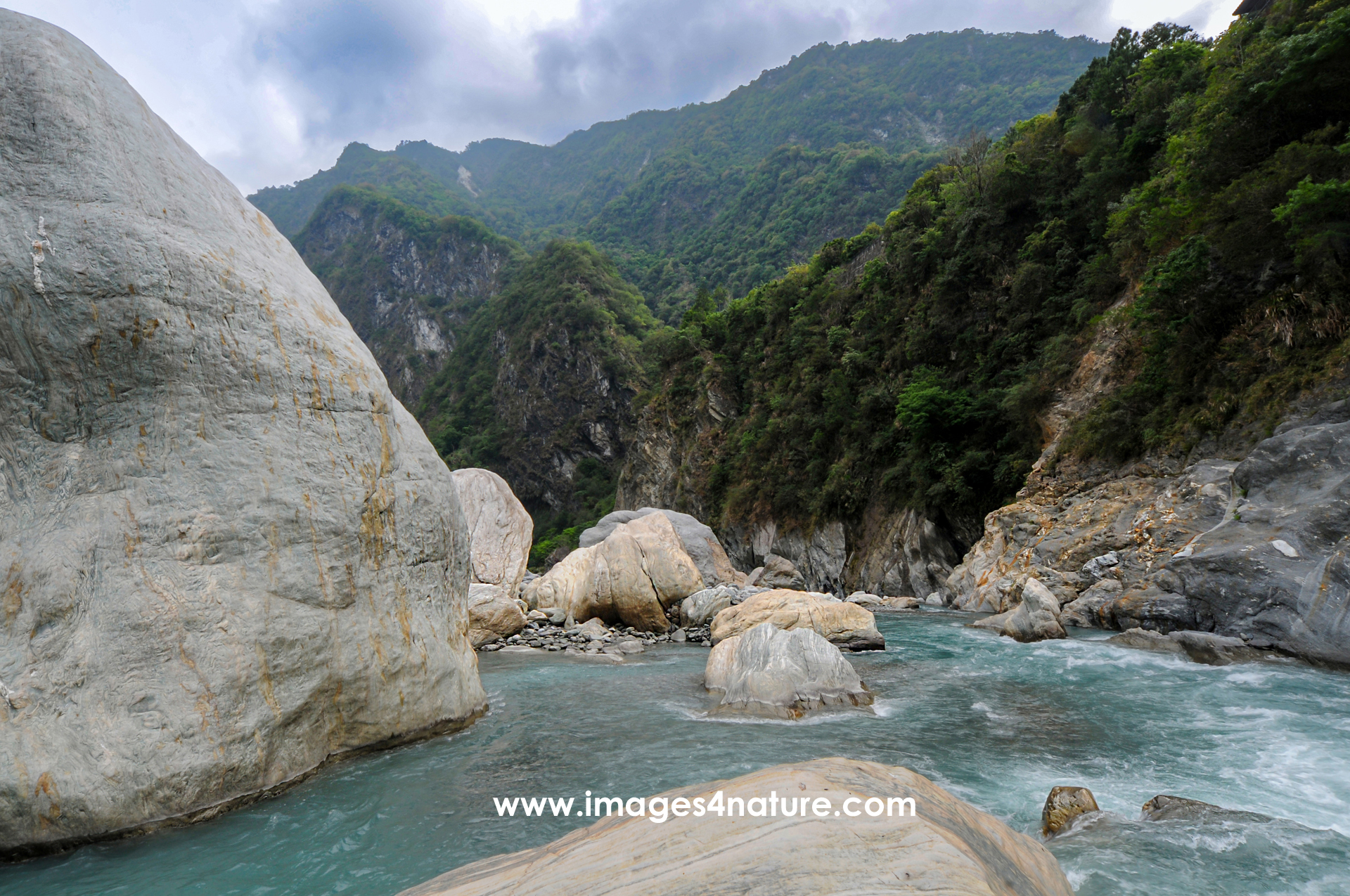 Scenic view of Taiwan's Taroko Gorge with stream and boulders