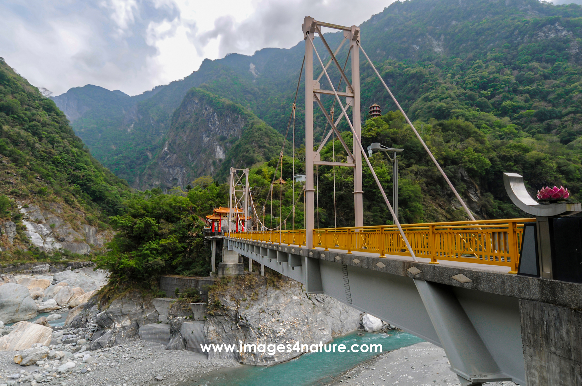 Metal suspension bridge diagonally crossing Taroko Gorge