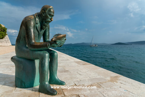 Metal statue of Croatian scientist Spiro Brusina at Zadar seafront