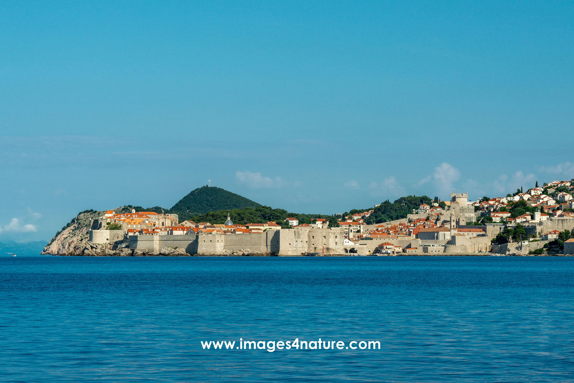 Old town Dubrovnik silhouette with city walls in the morning sun