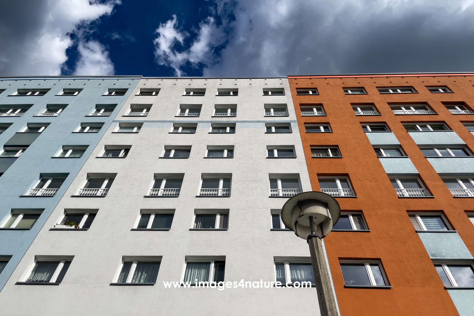 Low angle view of large and colorful Berlin residential building