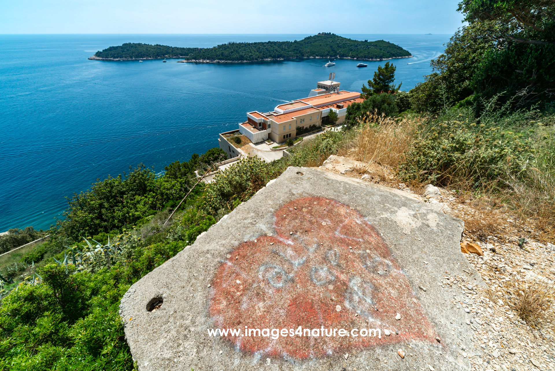 View on Lokrum island and Hotel Belvedere with red heart graffiti