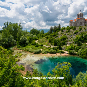 Orthodox church overlooking the turquoise colored Cetina river spring