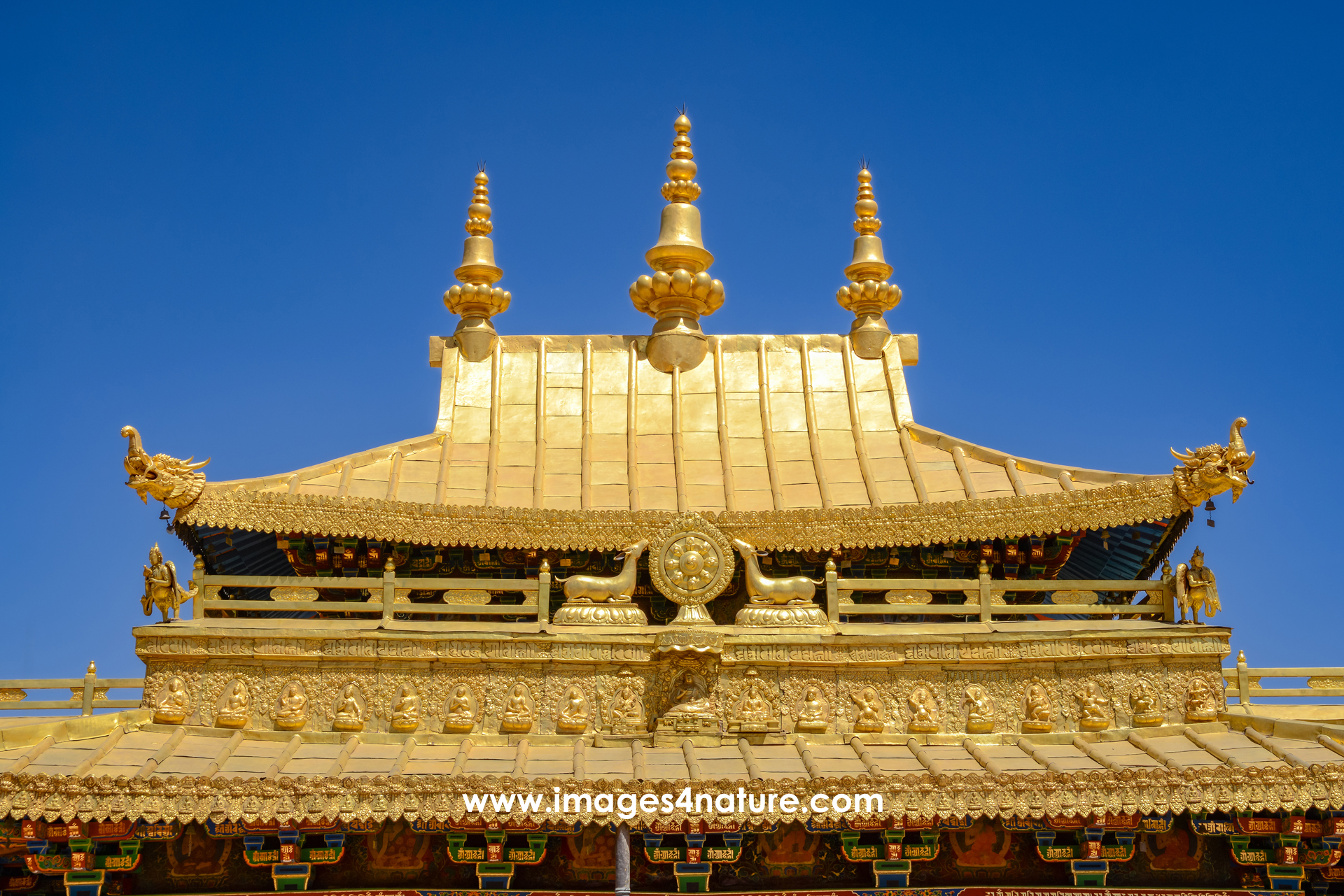 Jokhang Monastery golden roof against blue sky